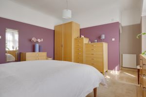 Bedroom One- click for photo gallery